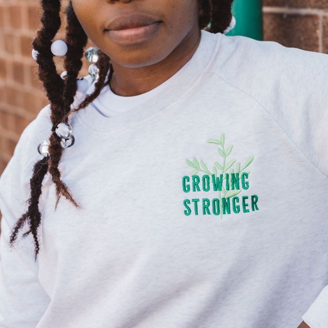 Growing Stronger Embroidered Women's Sweatshirt